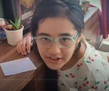 She uses spectacles to see clearly. 